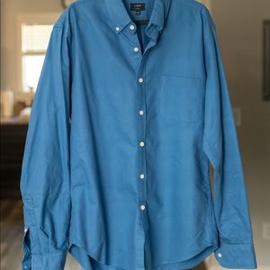 J. Crew long sleeve blue button down shirt.
